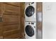Laundry room featuring stacked washer and dryer units at 108 E Saint Clair St # E, Indianapolis, IN 46204