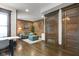 Spacious living room features exposed brick, hardwood floors, and stylish modern decor at 108 E Saint Clair St # E, Indianapolis, IN 46204