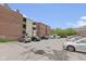 Apartment building parking lot with multiple parking spaces at 108 E Saint Clair St # E, Indianapolis, IN 46204