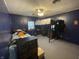 Bedroom with a loft bed, desk, storage, and a ceiling fan at 1122 Shelby St, Shelbyville, IN 46176