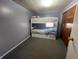 Cozy bedroom featuring a bunk bed with drawers and a closet, perfect for a room at 1122 Shelby St, Shelbyville, IN 46176