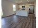 Modern kitchen equipped with stainless steel appliances, an island, and ample counter space at 11302 N Quillow Way, Monrovia, IN 46157