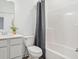 Modern bathroom with white cabinets, toilet, and shower at 11469 Lottie Cir, Noblesville, IN 46060