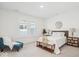 Bright bedroom with accent chair, bench, and natural light at 11469 Lottie Cir, Noblesville, IN 46060