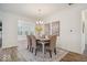 Bright dining room featuring modern chandelier and elegant decor at 11469 Lottie Cir, Noblesville, IN 46060