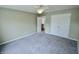 Bedroom with closet, ceiling fan, and access to hallway at 11850 Stepping Stone Dr, Fishers, IN 46037