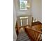 Grand two-story entryway featuring hardwood floors and staircase with wooden railings at 11850 Stepping Stone Dr, Fishers, IN 46037