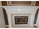 Close up of the fireplace with decorative mantle at 11850 Stepping Stone Dr, Fishers, IN 46037