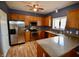 Kitchen with stainless steel appliances, granite countertops, and wooden cabinets at 11850 Stepping Stone Dr, Fishers, IN 46037