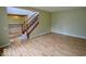 View of staircase and dining room at 11850 Stepping Stone Dr, Fishers, IN 46037