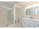 Clean, white bathroom featuring a shower/tub combo and modern vanity at 12290 Charing Cross Rd, Carmel, IN 46033