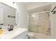 Well-lit bathroom features a bathtub/shower combo and a modern vanity at 12290 Charing Cross Rd, Carmel, IN 46033