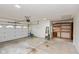 Spacious garage with storage shelves, utility access and automatic door at 12290 Charing Cross Rd, Carmel, IN 46033
