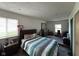 Spacious bedroom with neutral walls, carpet and a large bed at 128 Coronado Rd, Indianapolis, IN 46234