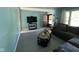 Inviting living room with gray flooring, a comfy sectional, and stylish decor at 128 Coronado Rd, Indianapolis, IN 46234