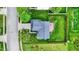 Aerial view showing the layout of a home with a spacious backyard, deck, and a well-kept lawn within a fenced perimeter at 13209 Westwood Ln, Fishers, IN 46038