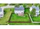 A large, fenced backyard with a deck is perfect for entertaining, playing, and enjoying the outdoor space at 13209 Westwood Ln, Fishers, IN 46038