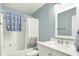 Cozy bathroom with a tub-shower combo and a vanity with clean white finishes at 13209 Westwood Ln, Fishers, IN 46038