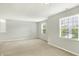 Bedroom with carpet, neutral paint and two windows at 13209 Westwood Ln, Fishers, IN 46038