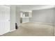 Hallway with carpet, a closet and access to the staircase at 13209 Westwood Ln, Fishers, IN 46038