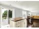 Bright eat-in kitchen with access to deck, natural light, and living room views at 13209 Westwood Ln, Fishers, IN 46038