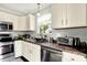 Kitchen featuring stainless appliances, countertops, and a window over the sink at 13209 Westwood Ln, Fishers, IN 46038