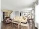 Open-concept living room featuring hardwood floors, neutral paint, and ample natural light at 13209 Westwood Ln, Fishers, IN 46038