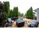 Relax on this lovely deck with outdoor seating and mature landscaping for privacy and tranquil enjoyment at 14030 Avalon East Dr, Fishers, IN 46037