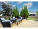 Enjoy outdoor living on this wooden deck with stylish furniture, perfect for entertaining and relaxation at 14030 Avalon East Dr, Fishers, IN 46037