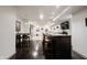 Spacious finished basement features a modern bar area with seating, ideal for relaxing and entertaining guests at 14030 Avalon East Dr, Fishers, IN 46037