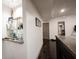 The finished basement features a convenient wet bar with modern fixtures and shelving, great for hosting at 14030 Avalon East Dr, Fishers, IN 46037