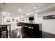Finished basement offers a modern bar area, providing a great space for entertainment and relaxation at 14030 Avalon East Dr, Fishers, IN 46037