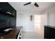 Bright room featuring a work desk and ceiling fan at 14030 Avalon East Dr, Fishers, IN 46037