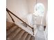 Open foyer with a grand staircase, large window, and chandelier, creating a bright and inviting entrance at 14030 Avalon East Dr, Fishers, IN 46037