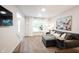 Cozy living room featuring modern decor, neutral tones, and plenty of natural light at 14030 Avalon East Dr, Fishers, IN 46037
