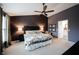 Spacious main bedroom features a vaulted ceiling, neutral colors, large windows, and ensuite access at 14030 Avalon East Dr, Fishers, IN 46037
