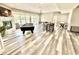 A spacious basement with a billiard table and a variety of entertaining games at 14035 Stone Key Way, Fishers, IN 46037