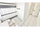 This bright, tiled bathroom features a toilet, and bath with shower and black/white curtain, white walls and new fixtures at 14035 Stone Key Way, Fishers, IN 46037