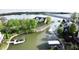 Aerial view showcasing the home's waterfront location and surrounding neighborhood at 14035 Stone Key Way, Fishers, IN 46040