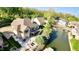 Expansive waterfront home with large deck, patio, and private boat dock at 14035 Stone Key Way, Fishers, IN 46040