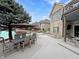 Backyard with patio dining set, canal views, and spacious deck for outdoor enjoyment at 14035 Stone Key Way, Fishers, IN 46040