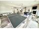 Spacious basement featuring a ping pong table, pool table, and ample entertainment space at 14035 Stone Key Way, Fishers, IN 46040