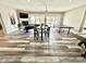 Large finished basement with hardwood style floors, fireplace, pool table, ping pong table and game table at 14035 Stone Key Way, Fishers, IN 46040