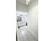 Clean bathroom with white vanity, ceramic tile floor, and neutral color palette at 14035 Stone Key Way, Fishers, IN 46040