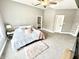 Spacious bedroom with neutral walls, carpet, and a ceiling fan at 14035 Stone Key Way, Fishers, IN 46040