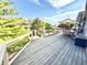 A spacious deck shows off a beautiful outdoor living space with room for grilling and entertaining at 14035 Stone Key Way, Fishers, IN 46040