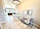 Bright and airy foyer showcasing the home's open layout and modern design elements at 14035 Stone Key Way, Fishers, IN 46040