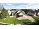 Well-maintained brick home with a verdant front lawn and charming curb appeal at 14035 Stone Key Way, Fishers, IN 46040