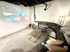 Inviting living room with a spacious sectional sofa, projector and carpeted floors at 14035 Stone Key Way, Fishers, IN 46040