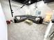Comfortable living room with a large sectional sofa, carpeted floors and projector at 14035 Stone Key Way, Fishers, IN 46040